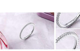 Small round eternity silver ring with cubic zirconia