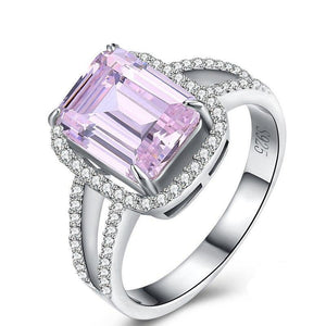 Silver ring with clear and purple cubic zirconia