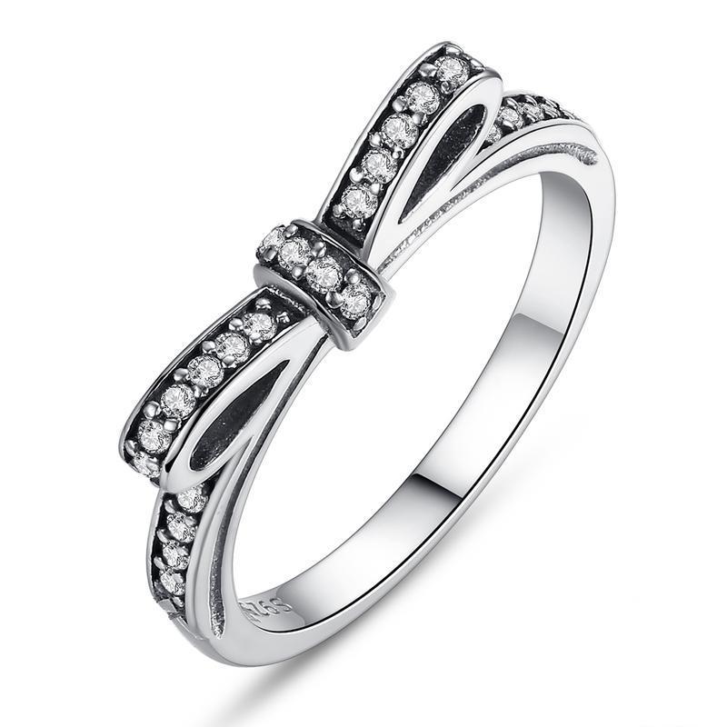 Bow silver ring with cubic zirconia